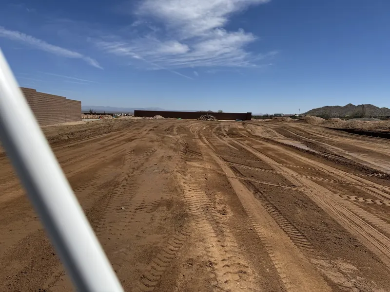 Rough grading and excavation work in desert terrain